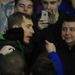 Everton defender Tony Hibbert watches the game from the away end