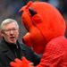 Sir Alex Ferguson gets some attention from Manchester United mascot Fred the Red.