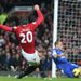 Toffees defender Johnny Heitinga is helpless to stop Van Persie slotting home after the striker rounds goalkeeper Tim Howard.