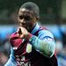 N'Zogbia celebrates after scoring Villa's second of the afternoon with a well-struck free-kick.
