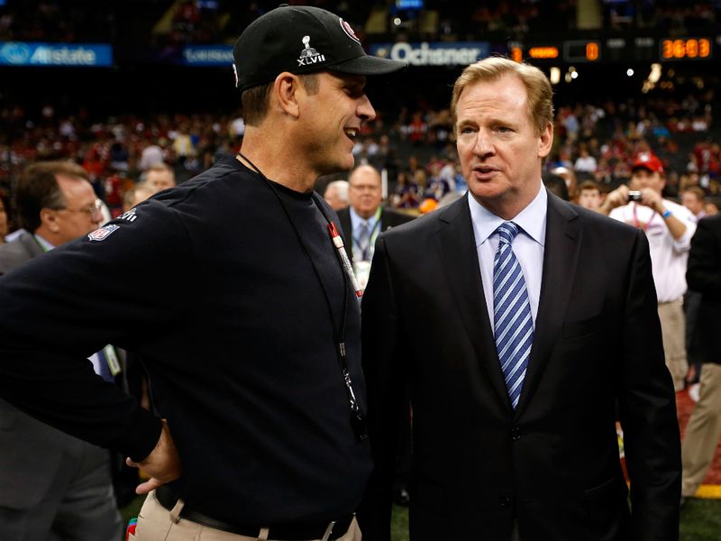NFL commissioner Roger Goodell stopped for a chat with San Francisco head coach Jim Harbaugh