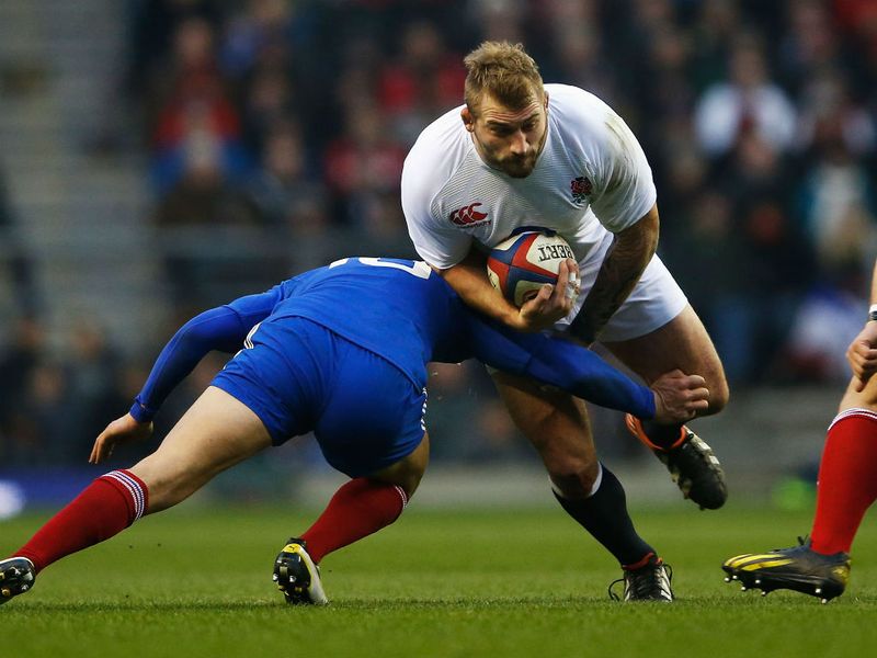 England's Joe Marler is tackled by Francois Trinh Duc