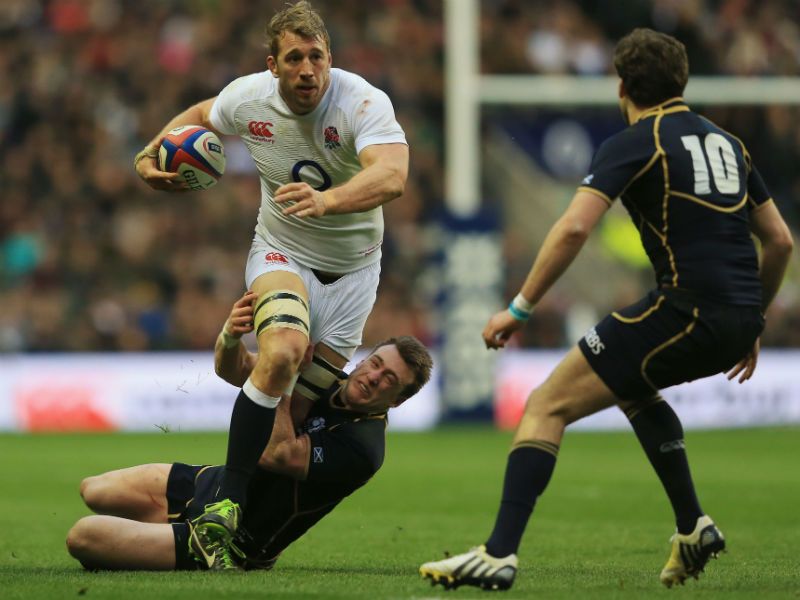 Good battle: Chris Robshaw is tackled by Stuart Hogg