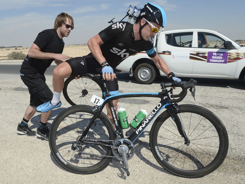 Chris Sutton gets a new wheel as the desert took its toll on the peloton