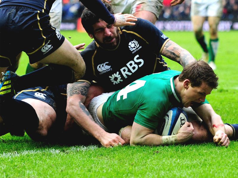 Wing Craig Gilroy of Ireland barges over to score the opening try early in the second half