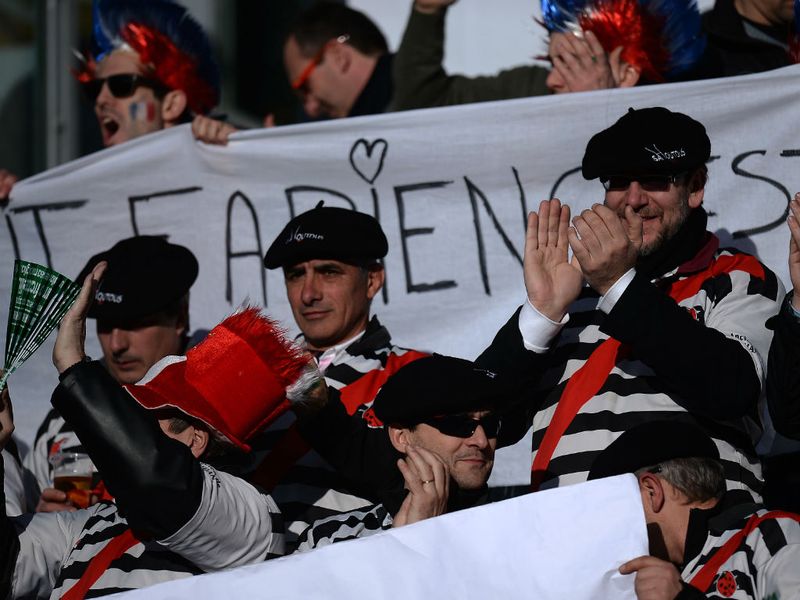 Out in force: Tricolores, berets, moustaches and even a few onions on show