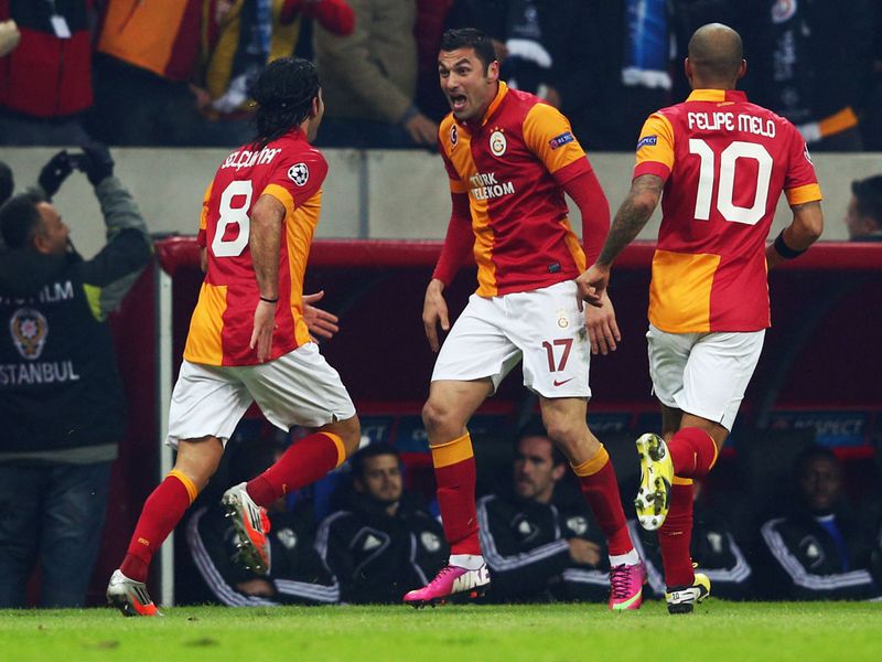 Burak Yilmaz celebrates after giving the Turkish giants a 1-0 lead