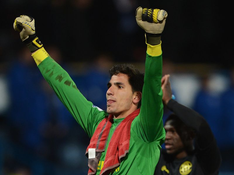 Huddersfield pulled a goal back but it wasn't enough to stop Wigan progressing with a 3-1 success.