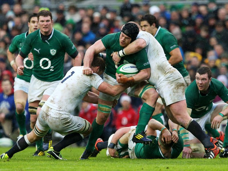 No way through: Ireland's Sean O'Brien is tackled by Chris Robshaw and Dan Cole