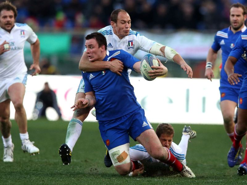 Neck ringer: Louis Picamoles is manhandled by Sergio Parisse
