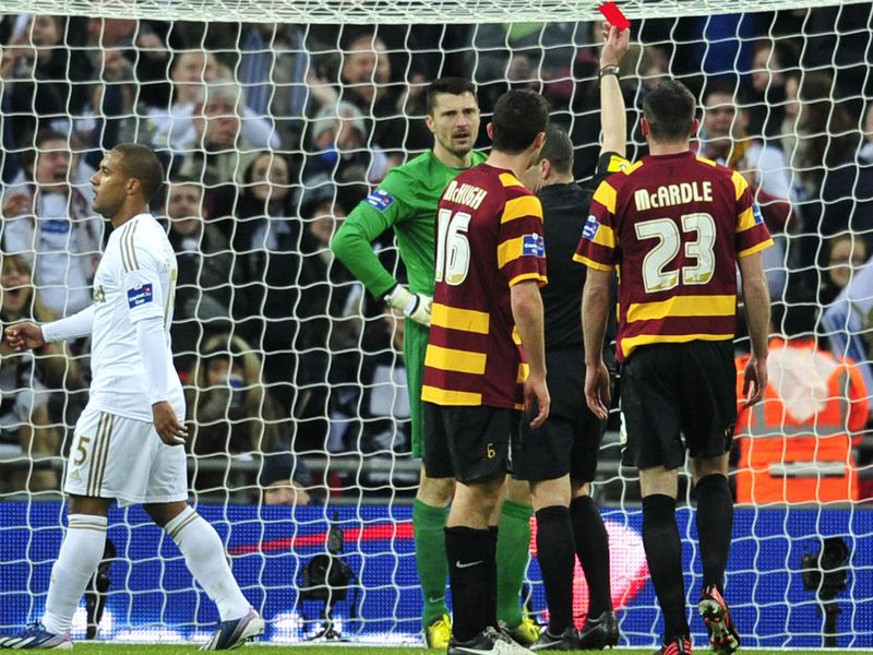 Bradford's day goes from bad to worse as goalkeeper Matt Duke is sent off for bringing down Jonathan de Guzman for a penalty