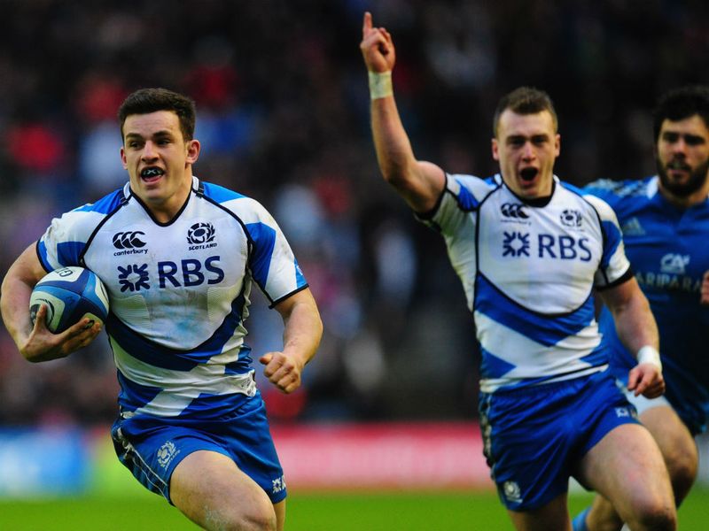 Great Scott: Stuart Hogg celebrates as Scott runs in the hosts' second try