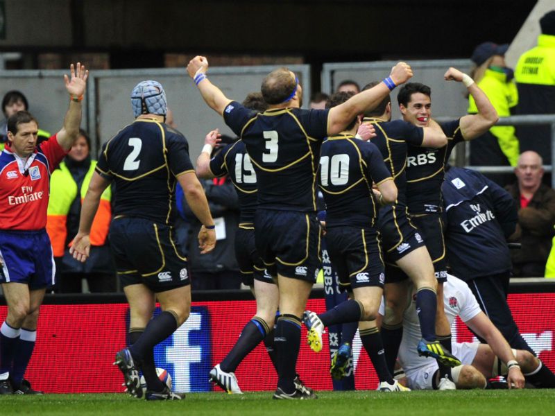 ...with the visitors celebrating his try