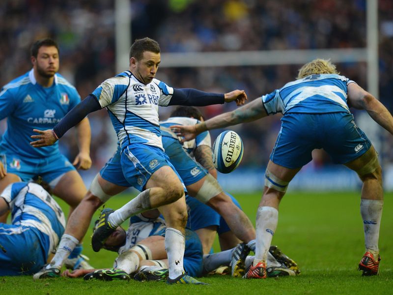 With the boot: Scrum-half Greig Laidlaw moves Scotland downfield