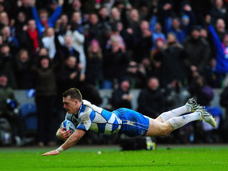 What a score: Hogg leaps over the line to celebrate his superb breakaway try