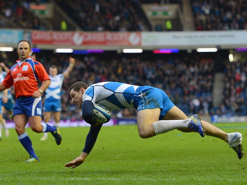 He's home: Visser runs clear and dives over for Scotland's first try
