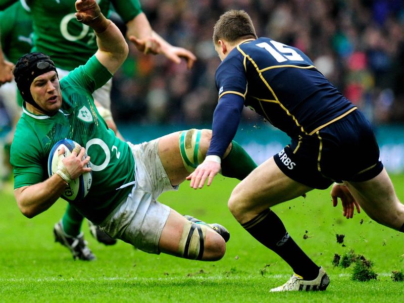 Sean O'Brien loses his footing as he is challenged by Stuart Hogg in a rip-roaring contest