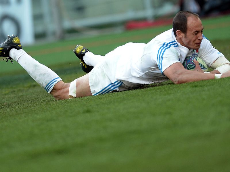 Flying home: The number eight dives in at the corner for the hosts