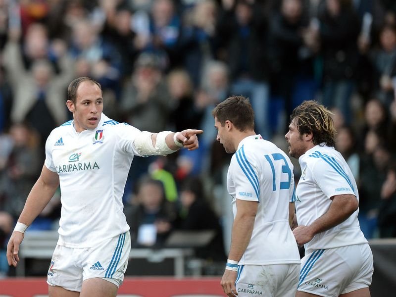 The man: Parisse celebrates the opening try with his team-mates