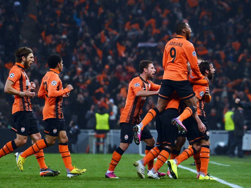 Shakhtar Donetsk celebrate after Darijo Srna's free-kick gives the hosts the lead against Borussia Dortmund
