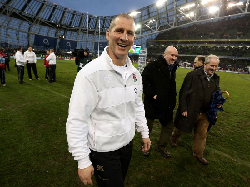 All smiles: Heach Coach Stuart Lancaster is a happy man with England's Grand Slam dream still alive