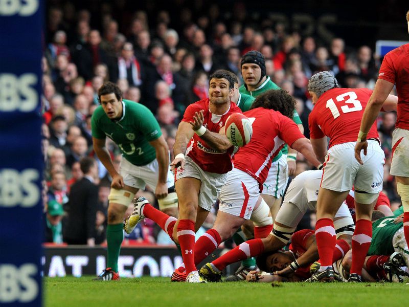 Fully focused: Wales' Jamie Roberts passes the ball