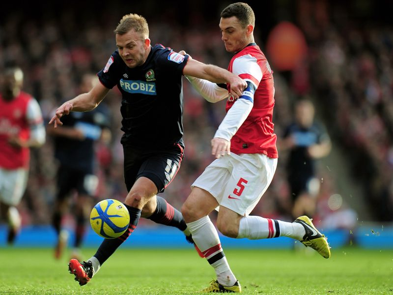 Jordan Rhodes fends off the attentions of Thomas Vermaelen