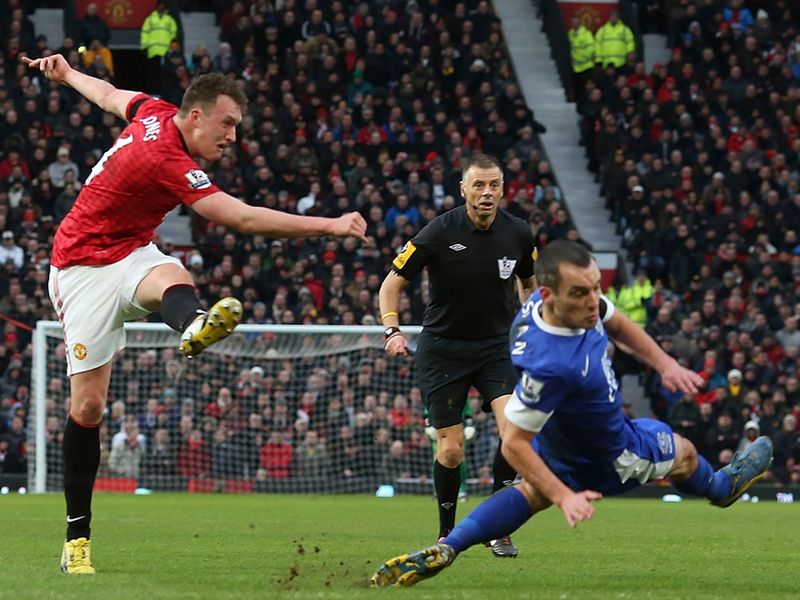 Phil Jones tries his luck with a shot for United in the first half at Old Trafford.