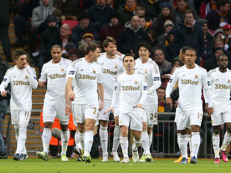 The Swans' goal-machine Michu adds another before the break to make it 2-0 and hand Bradford a tough task