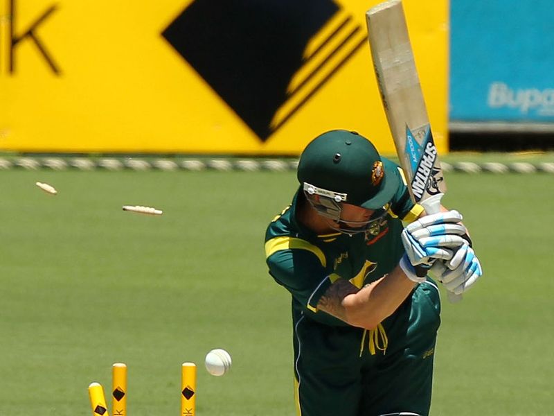 Michael Clarke missed a straight delivery from Dwayne Bravo.