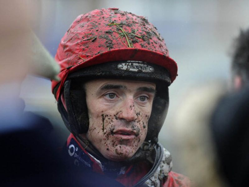 A muddy Ruby Walsh after riding in the opener at Newbury