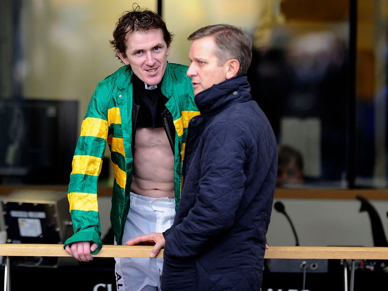 Tony McCoy grabs a quick word with Jeremy Kyle between races