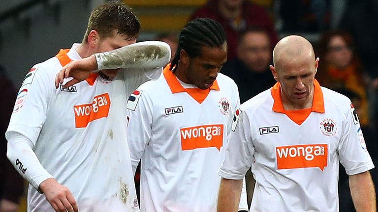 Gary MacKenzie: Struck (L) struck late for Blackpool