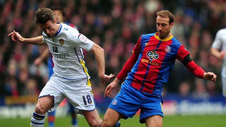 Glenn Murray (right): Battles for the ball with Michael Tonge
