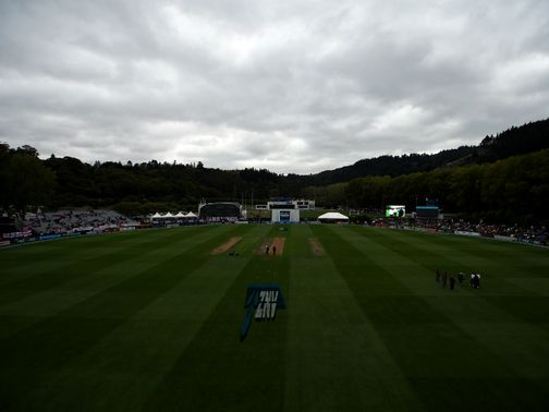 A murky scene on the first morning at the University Oval