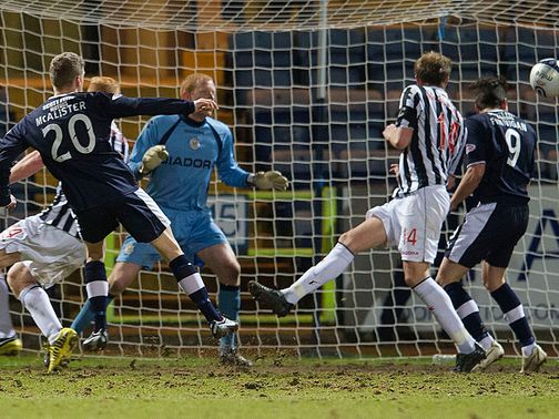 Jim McAlister scores the winning goal for Dundee