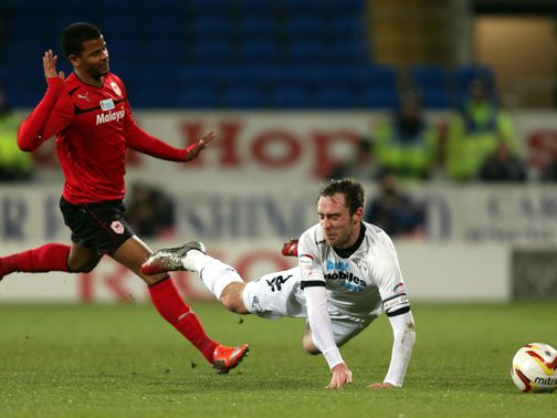 Richard Keogh is fouled by Fraizer Campbell