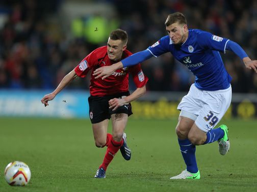 Craig Noone and Chris Wood battle for the ball