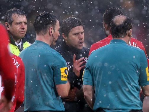 Pochettino confronts the officials at Carrow Road
