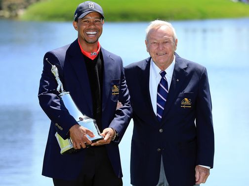 Tiger Woods celebrates with Arnold Palmer at Bay Hill