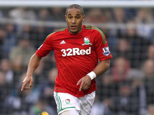 Ashley Williams: Not planning on leaving Swansea, according to his agent