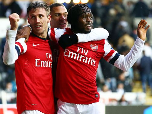 Arsenal: Monreal and Gervinho celebrate