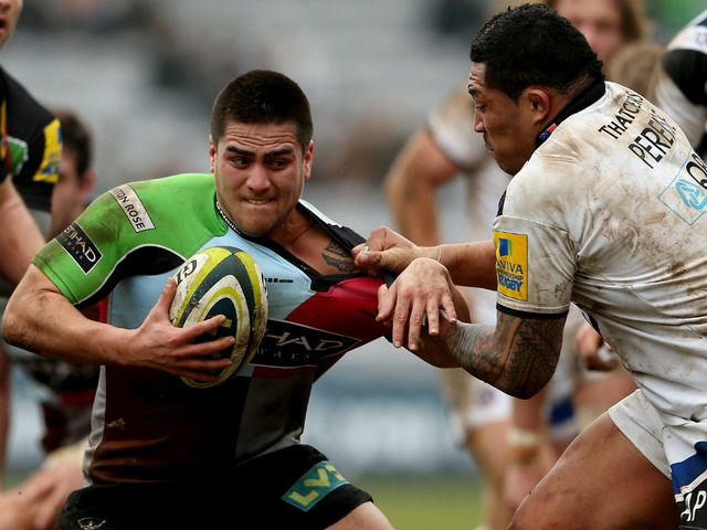 Ben Botica is tackled by Anthony Perenise.