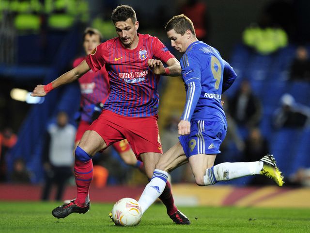 Fernando Torres scores Chelsea's third goal against Steaua