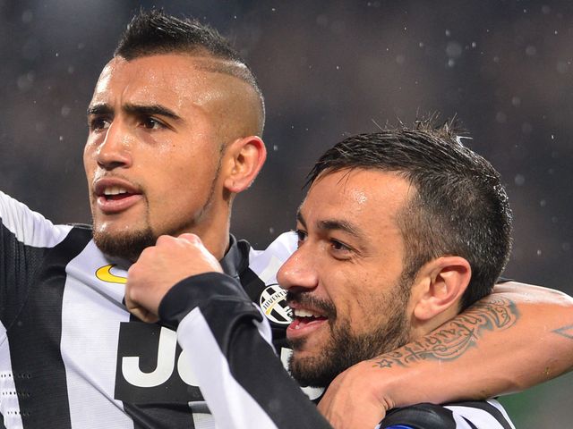 Fabio Quagliarella celebrates his goal with Arturo Vidal
