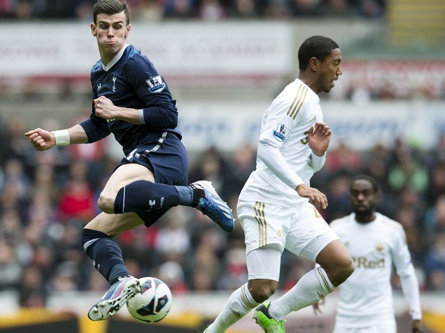 Gareth Bale competes with Jonathan de Guzman