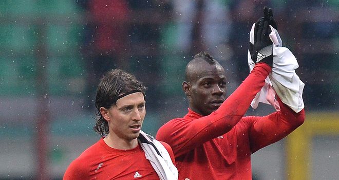 Mario Balotelli applauds the fans after AC Milan's victory