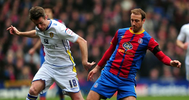 Glenn Murray (right): Battles for the ball with Michael Tonge