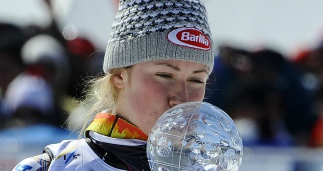 Mikaela Shiffrin: American teenager kisses the crystal globe after her slalom victory