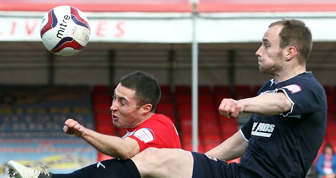Mike Jones: Crawley star is challenged by Stevenage's David Gray